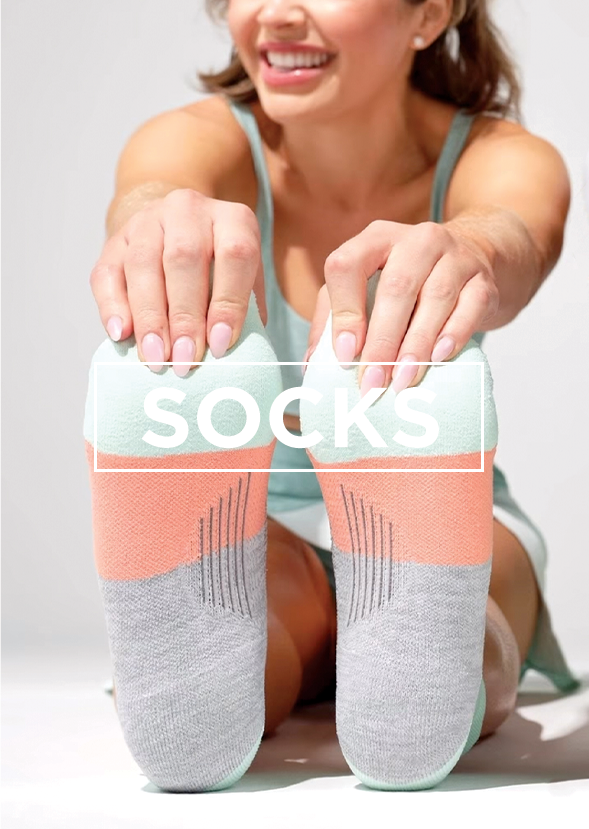 Woman wearing socks stretching